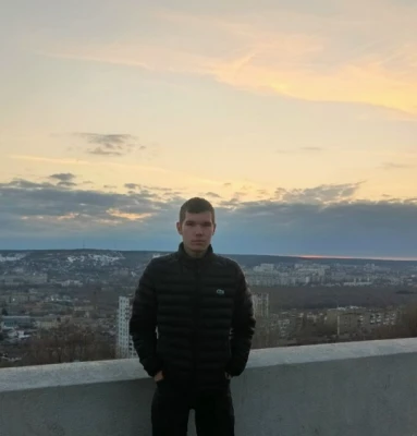 Николай